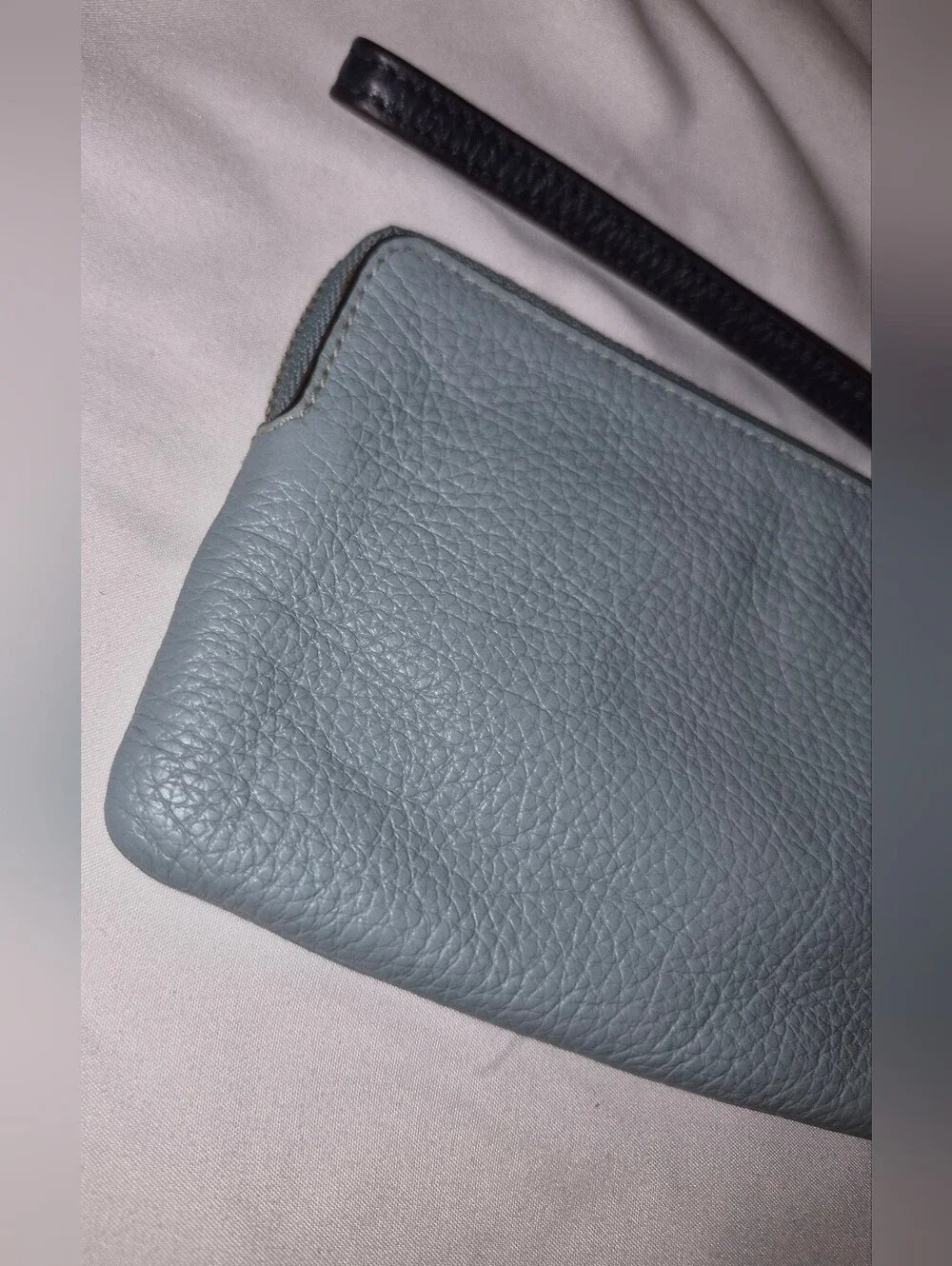 Coach corner zip